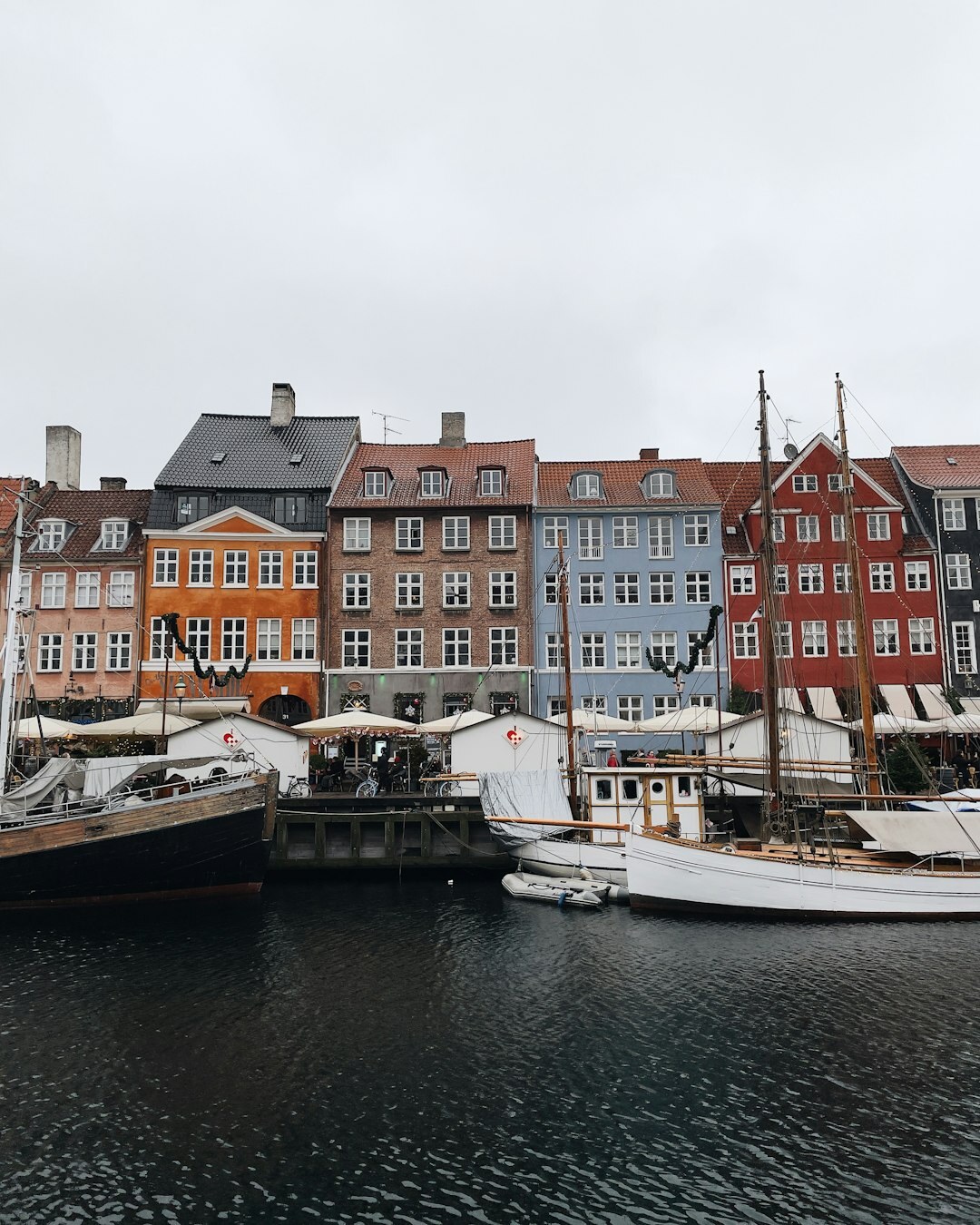 Local Danish market with people talking and trading goods