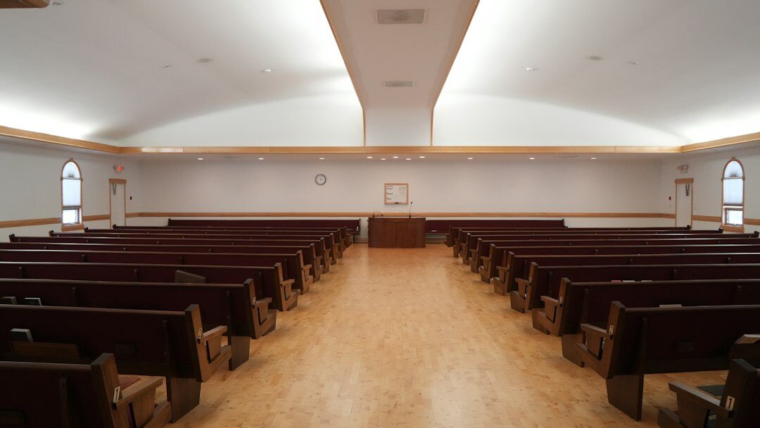 Danish villagers gathered in a community hall for a local meeting